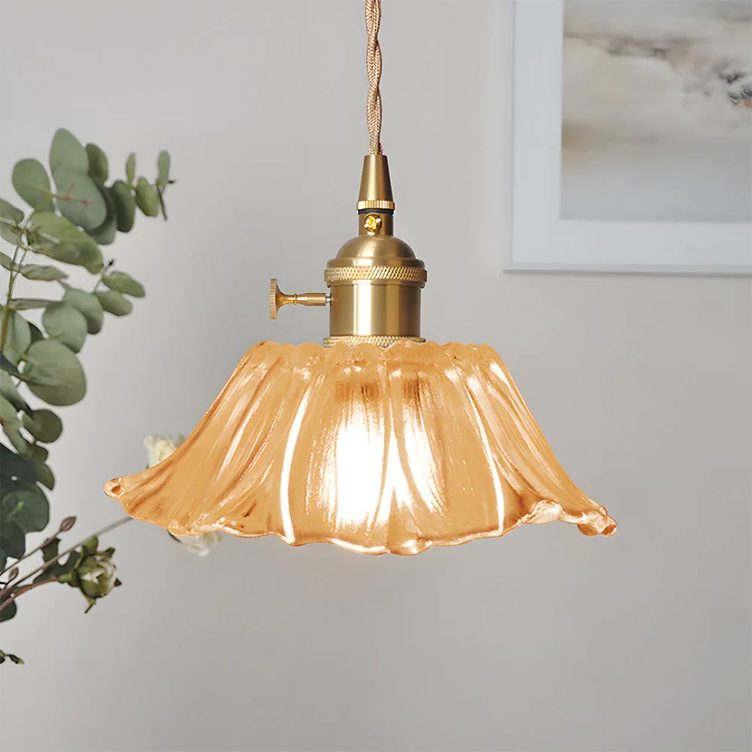 Flower-shaped pendant light – Deep red glass with a gold socket, perfect for the dining room or living room