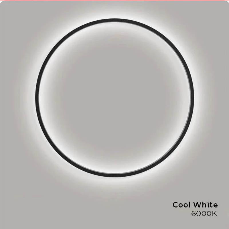 Ring LED Wall Lamp, black circular ring mounted on wall with soft white glow.