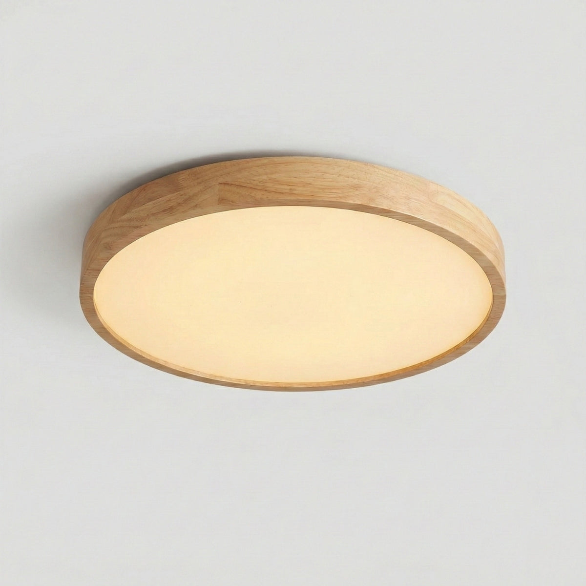 Ceiling light fixture with wooden frame and white shade on a gray background