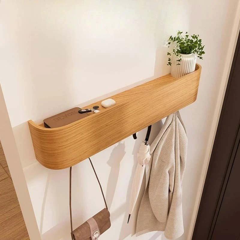 Wood & Iron Coat Rack with Hidden Hooks & Shelf on an entryway wall; a wooden organiser for coats and bags.