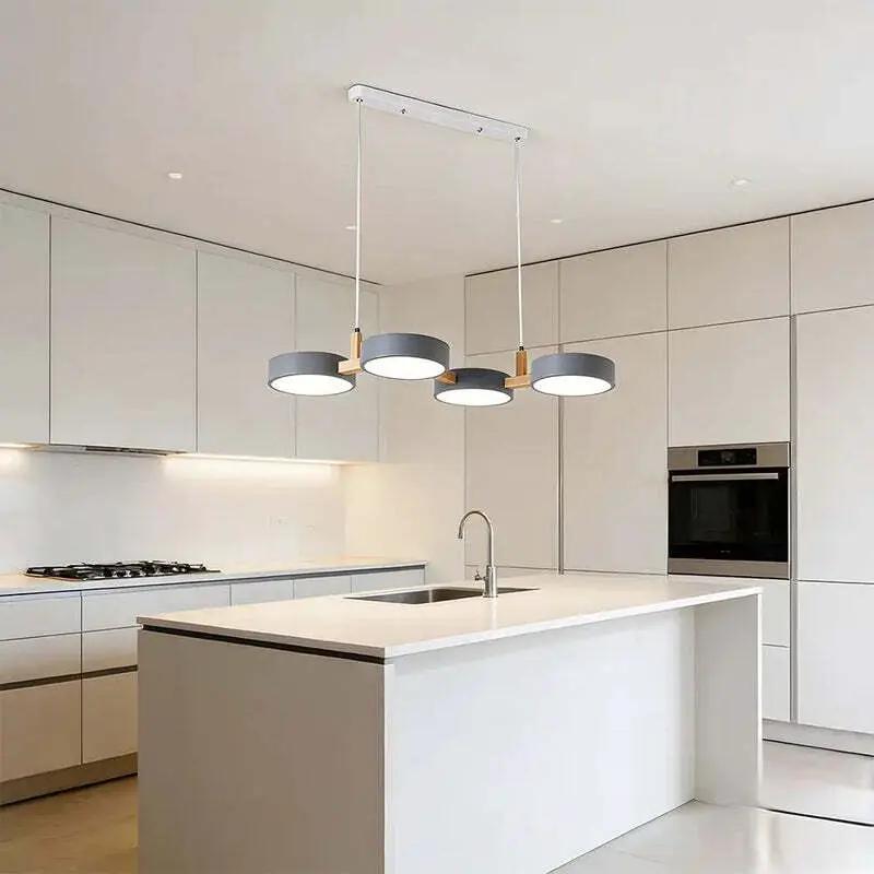 Modern Nordic kitchen island pendant light with four integrated LED shades and minimalist ceiling design (10795371266381)