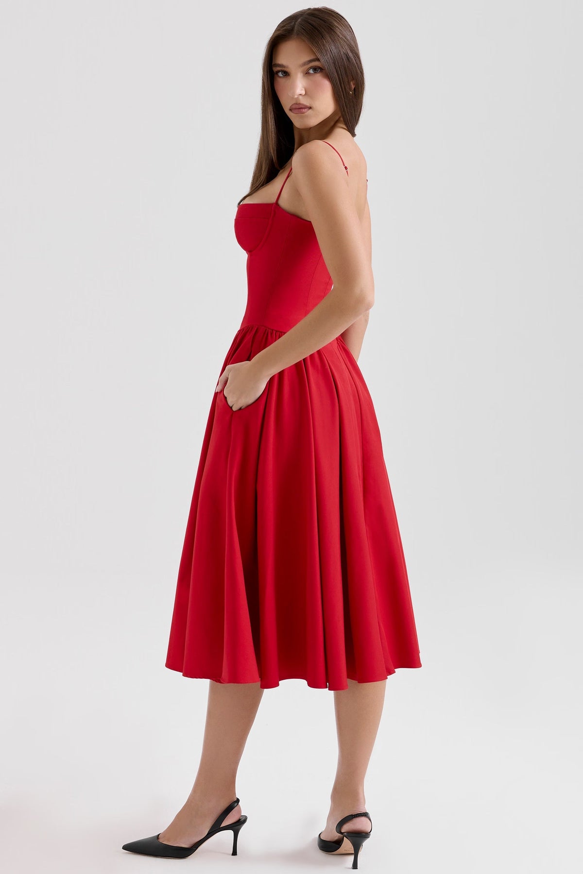 Red corset midi dress side view showing structured bodice