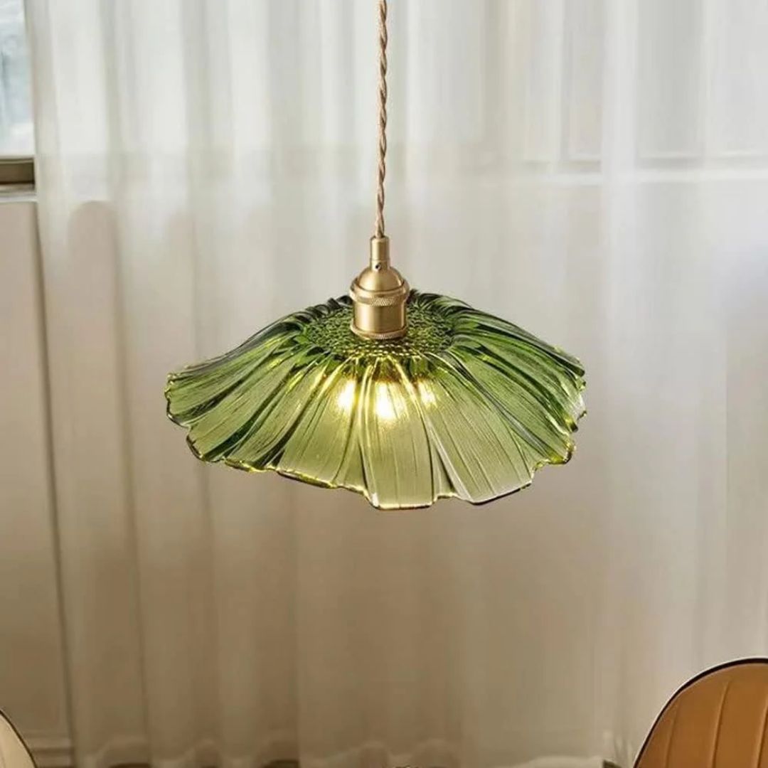 Flower-shaped pendant light – Deep red glass with a gold socket, perfect for the dining room or living room