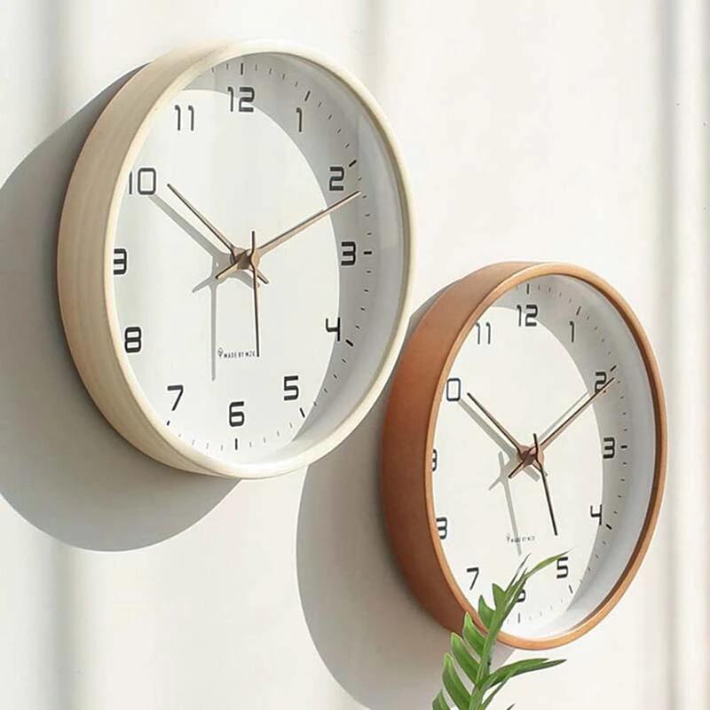 Nordic Wooden Wall Clock - Minimalist Silent Timepiece: two cream and brown wooden-framed clocks on a light wall