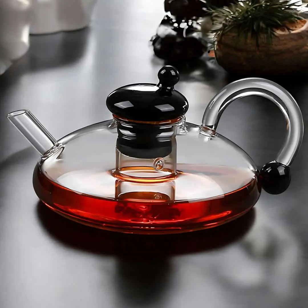 glass teapot set with cups in transparent