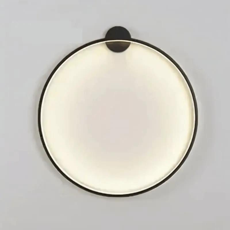 KRETS modern black LED ring wall lamp with illuminated circular acrylic diffuser and metal wall mount